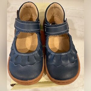 Livie and Luca Navy ruche leather shoe.
